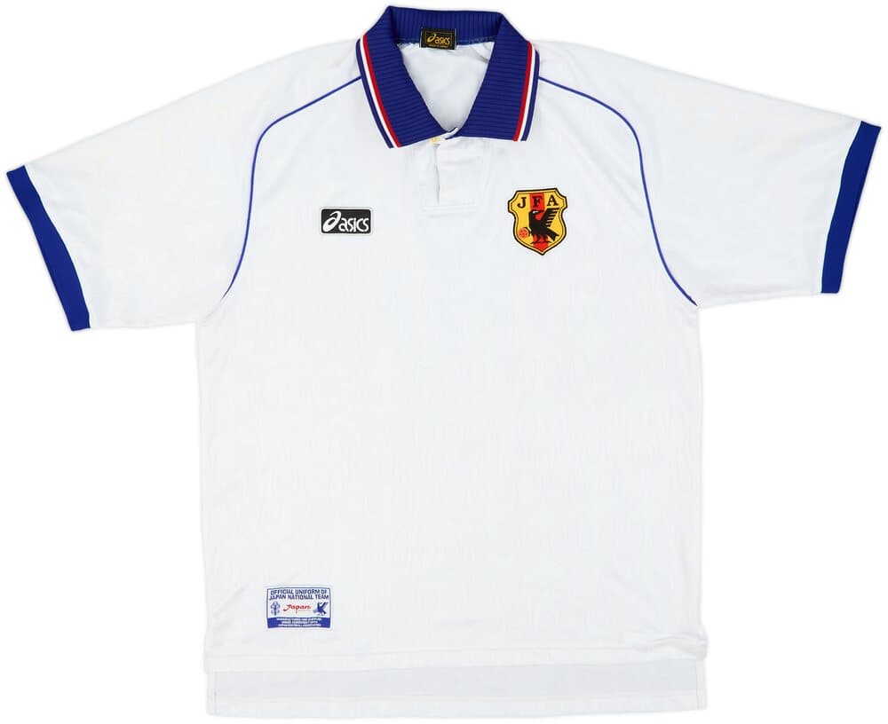 Japan 1998 away shirt, front: white with a tonal flame pattern, a blue polo collar with red and white trim, the ASICS logo and the JFA crest.