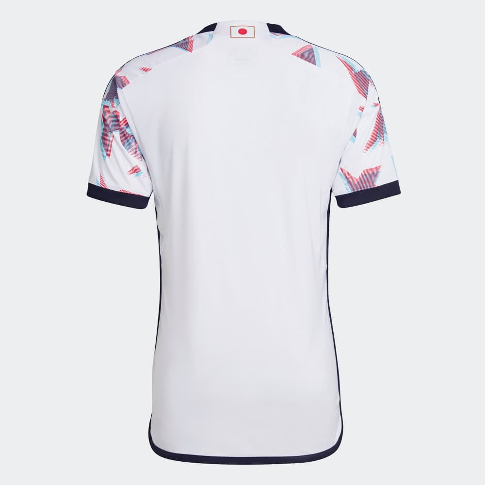 Japan 2022 away shirt, back: white with navy trim and the Hinomaru flag tab at the neckline.