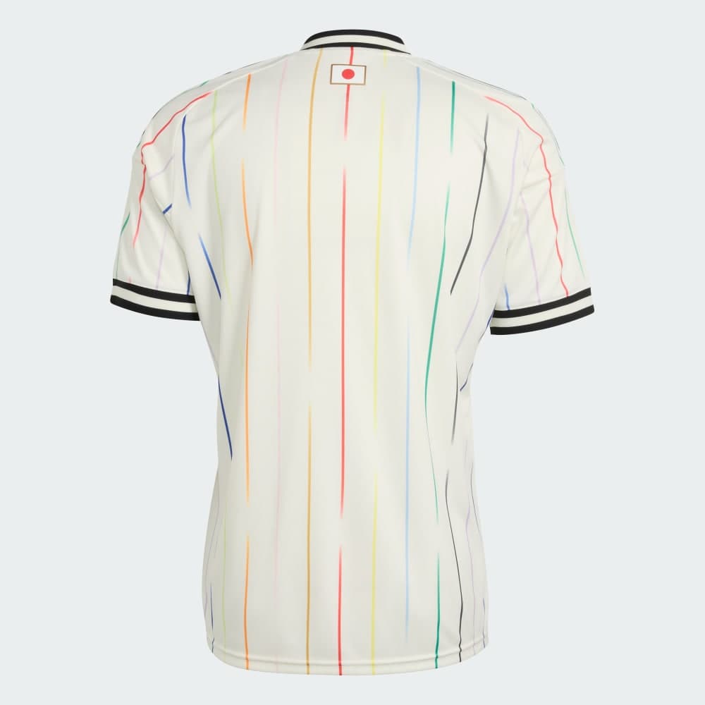 Japan 2026 away shirt, back view: the multicolor pinstripes continue over the off-white back, with the Hinomaru flag tab at the neckline and black trim.