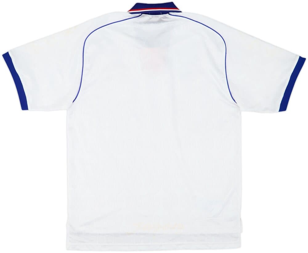Japan 1998 away shirt, back: white with the tonal flame pattern, a blue polo collar and blue piping.