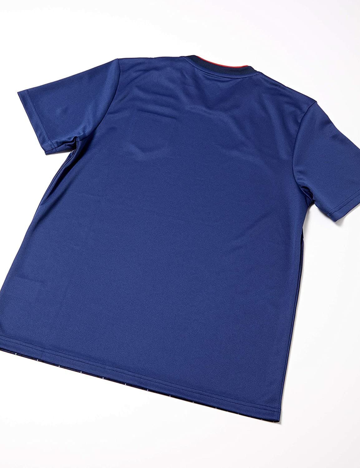 Japan 2018 home shirt, back: solid deep indigo with a red collar (the Sashiko graphic is on the front only).